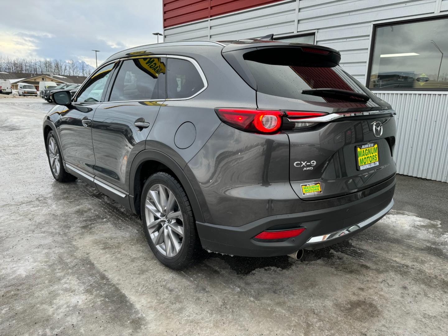 2021 Gray /Black Mazda CX-9 Grand Touring AWD (JM3TCBDY5M0) with an 2.5L L4 DOHC 16V engine, 6A transmission, located at 1960 Industrial Drive, Wasilla, 99654, (907) 274-2277, 61.573475, -149.400146 - Photo#3